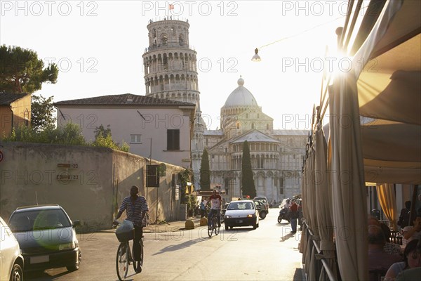 View of the Leaning Tower of Pisa from city street