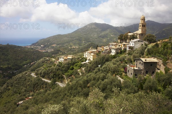 Village on hilltop in rural landscape