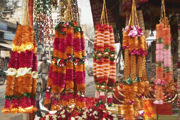 Flower garlands for sale in outdoor market