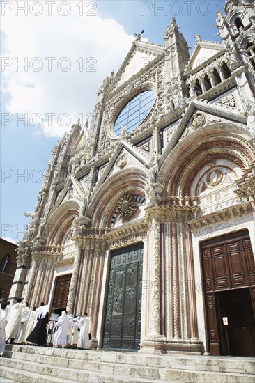 People standing outside Duomo