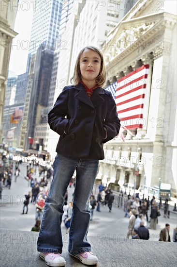 Girl standing outside New York Stock Exchange