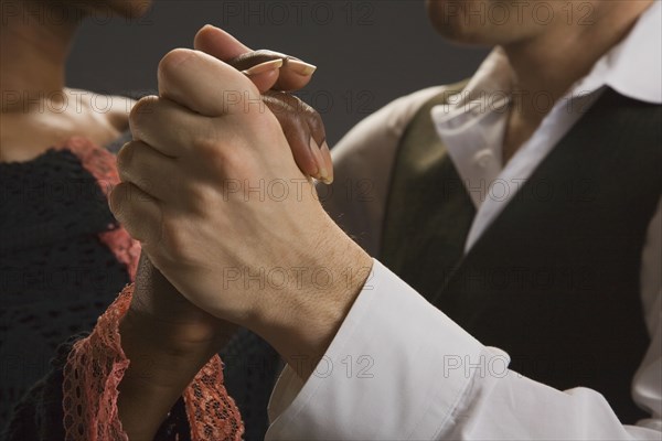 Multi-ethnic couple dancing