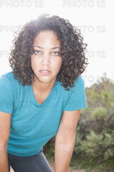 Tired woman resting after exercise