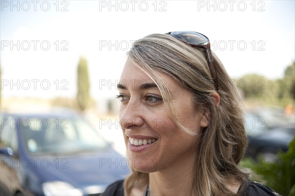 Smiling Caucasian woman standing outdoors