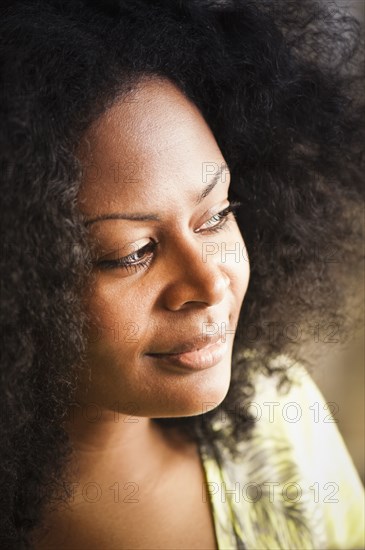 Close up of smiling mixed race woman