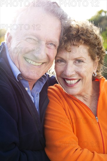 Caucasian couple smiling outdoors