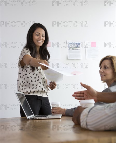 Business people talking in meeting