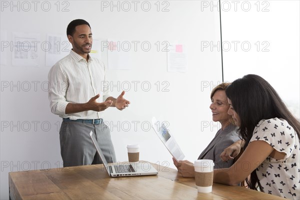 Business people talking in meeting