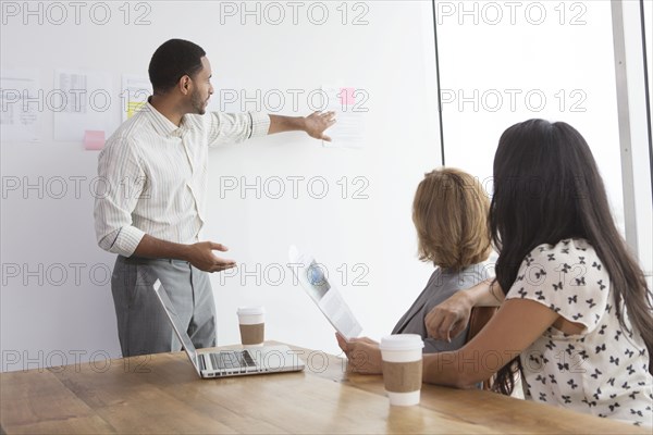 Business people talking in meeting