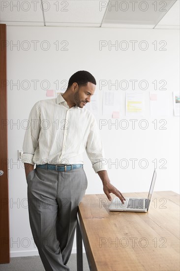 Black businessman working in office