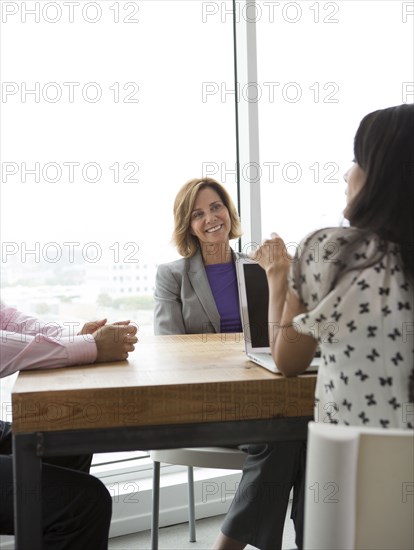 Business people talking in meeting