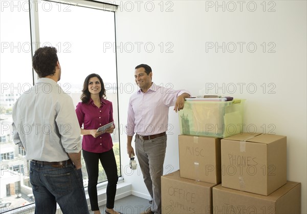 Business people talking in new office