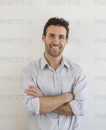 Hispanic businessman smiling