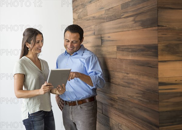 Business people using digital tablet