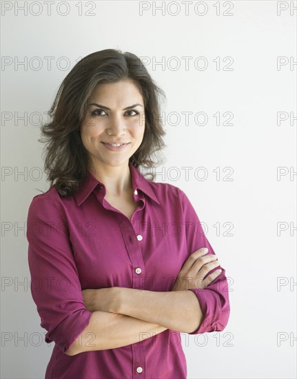 Mixed race businesswoman smiling