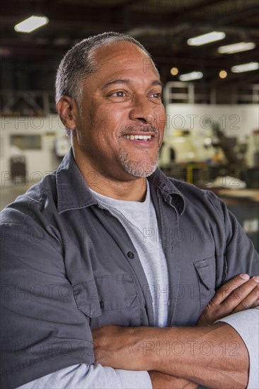 Worker smiling in warehouse