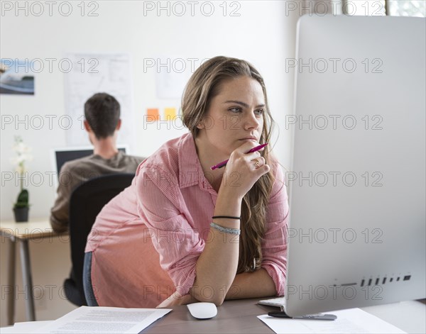 Caucasian architect working in office