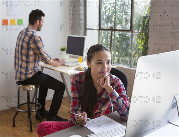 Architects working in office