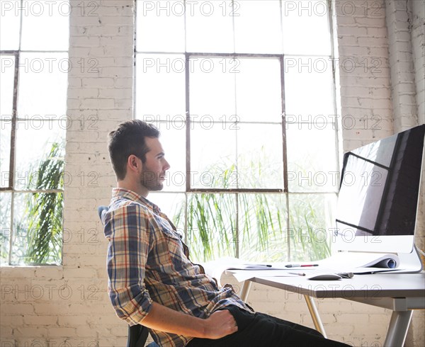 Caucasian architect working in office