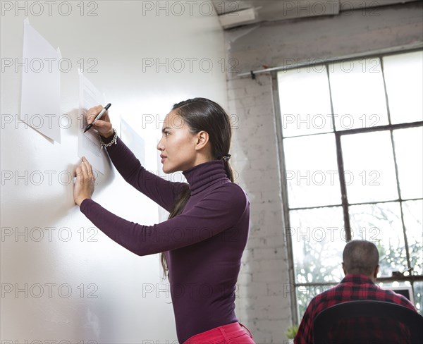 Architects working in office