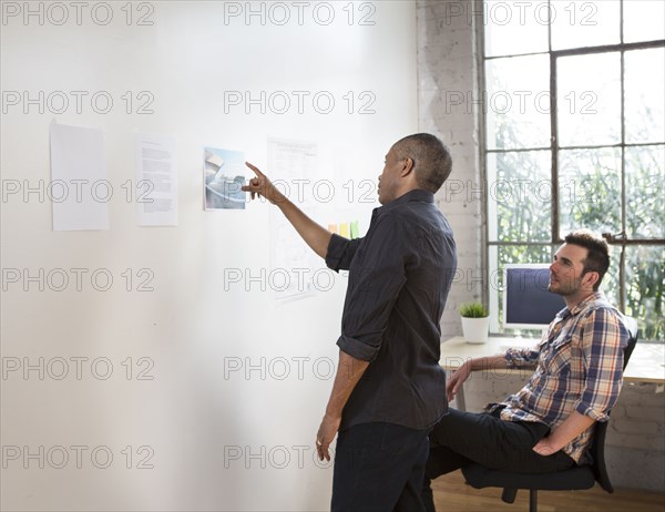 Architects working together in office