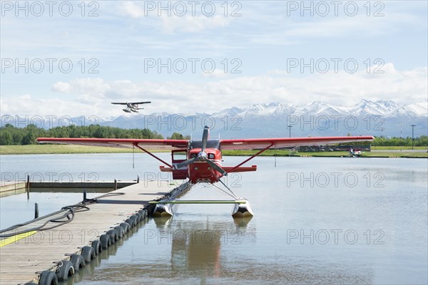 Seaplane docked in rural river