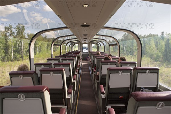 Windows of tour bus in rural landscape