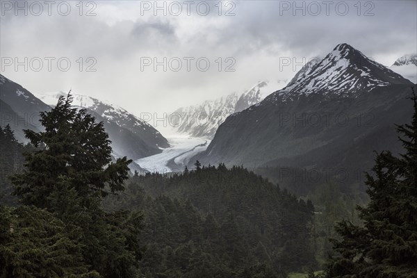 Snow covered mountains in rural landscape