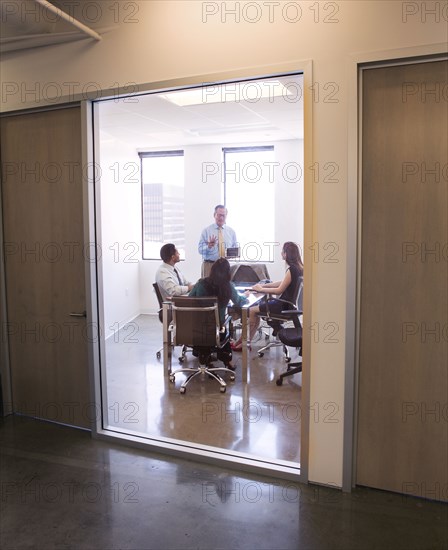 Business people talking in meeting