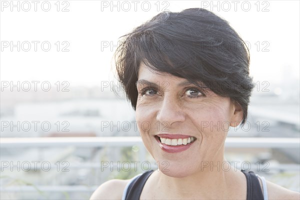 Close up of mixed race woman smiling