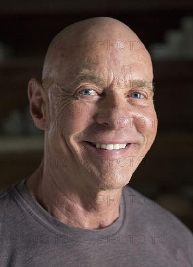 Close up of smiling face of older Caucasian man