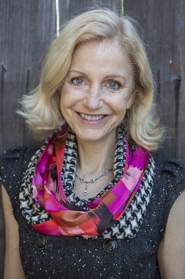 Close up of smiling Caucasian woman