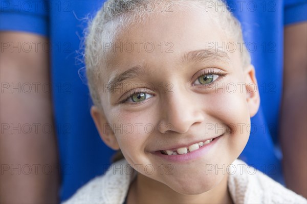 Close up of smiling girl with father