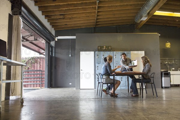 Business people talking in office meeting