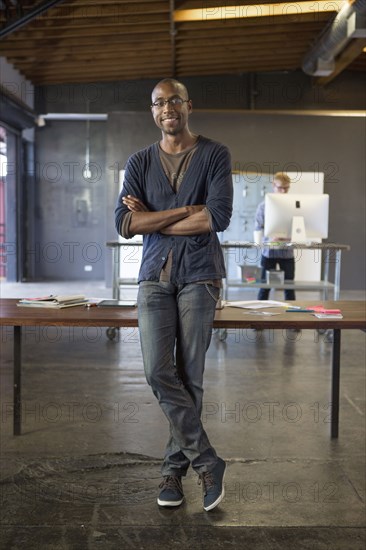 Businessman smiling in office