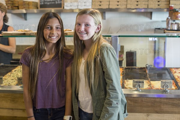 Girls smiling in cafe