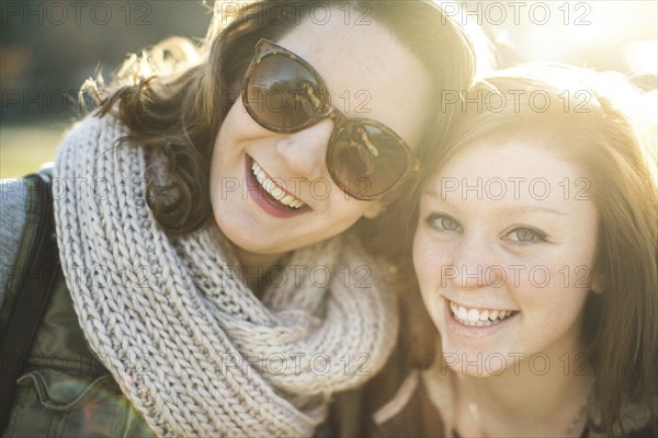 Caucasian women smiling outdoors