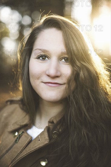 Smiling Caucasian woman with long hair