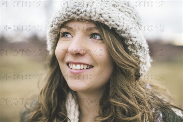 Caucasian woman wearing knitted cap