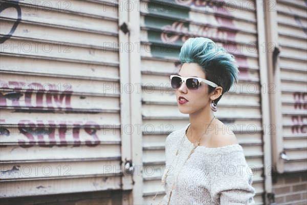 Caucasian woman walking at warehouse