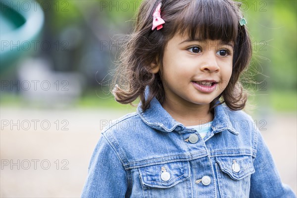 Close up of girl walking at playground