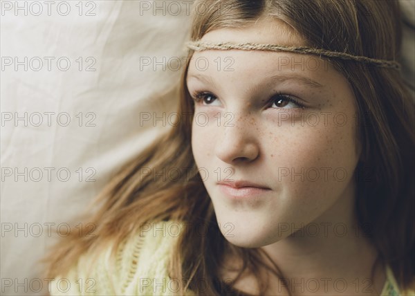 Caucasian girl wearing braid headband