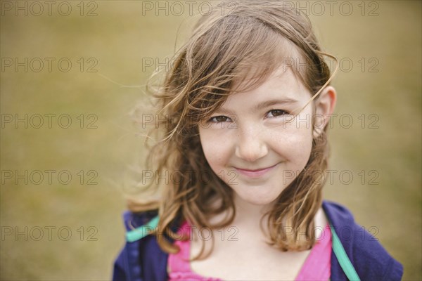 Close up of smiling Caucasian girl