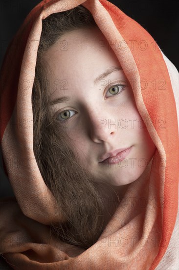 Close up of Caucasian girl wearing headscarf