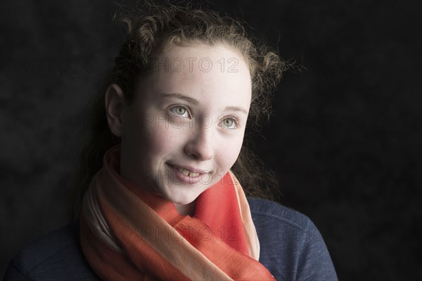 Close up of Caucasian girl wearing scarf