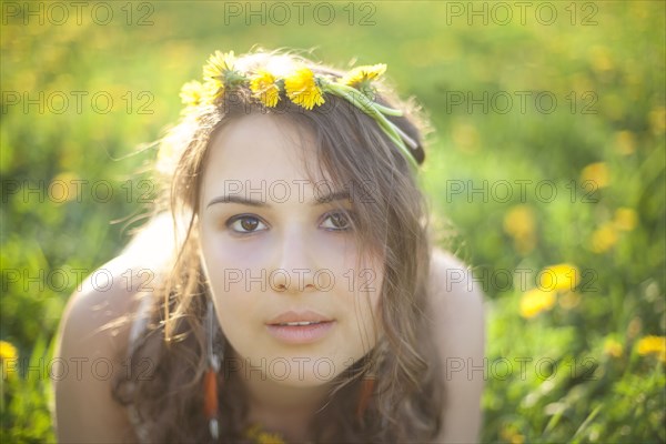 Caucasian woman wearing flowers in her hair