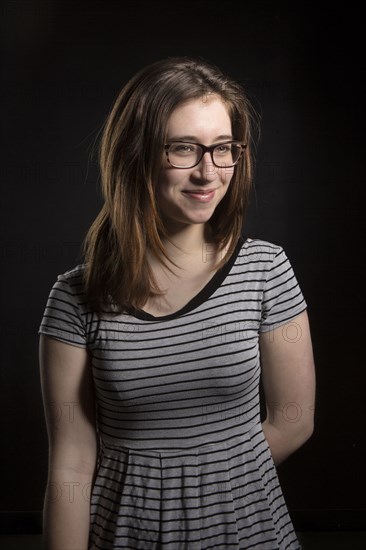 Close up of smiling Caucasian woman wearing eyeglasses