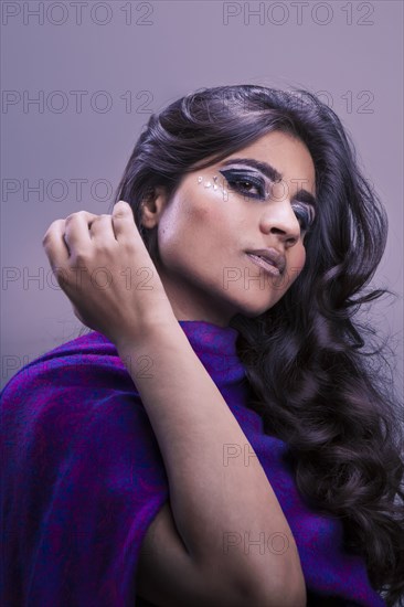 Close up of glamorous serious Pakistani woman