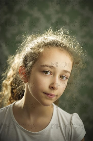 Close up of somber Caucasian girl