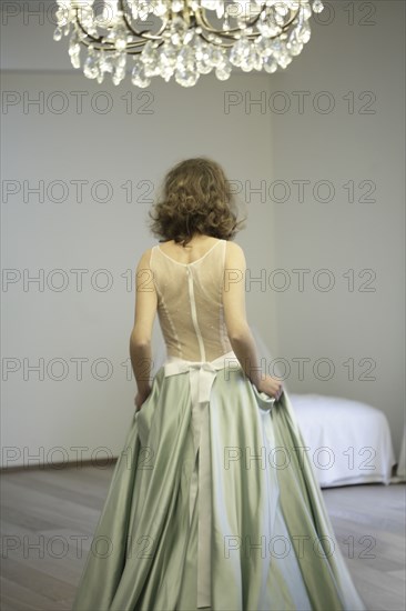 Rear view of bride wearing wedding dress